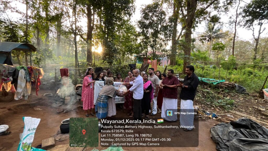 CKRM College NSS team distributing necessary food supplies to the tribal families at Irulam